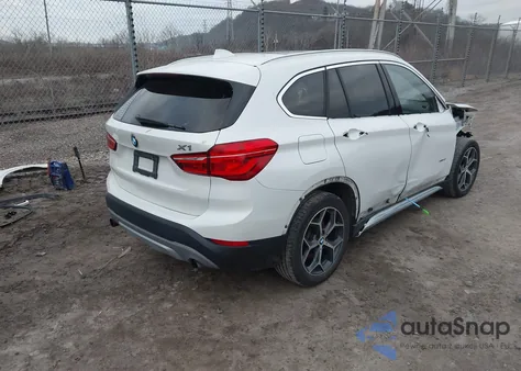 2017 BMW X1 xDrive28I z USA, uszkodzony, nr VIN WBXHT3C31H5F81871